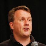 Paul Graham Speaking on a Microphone